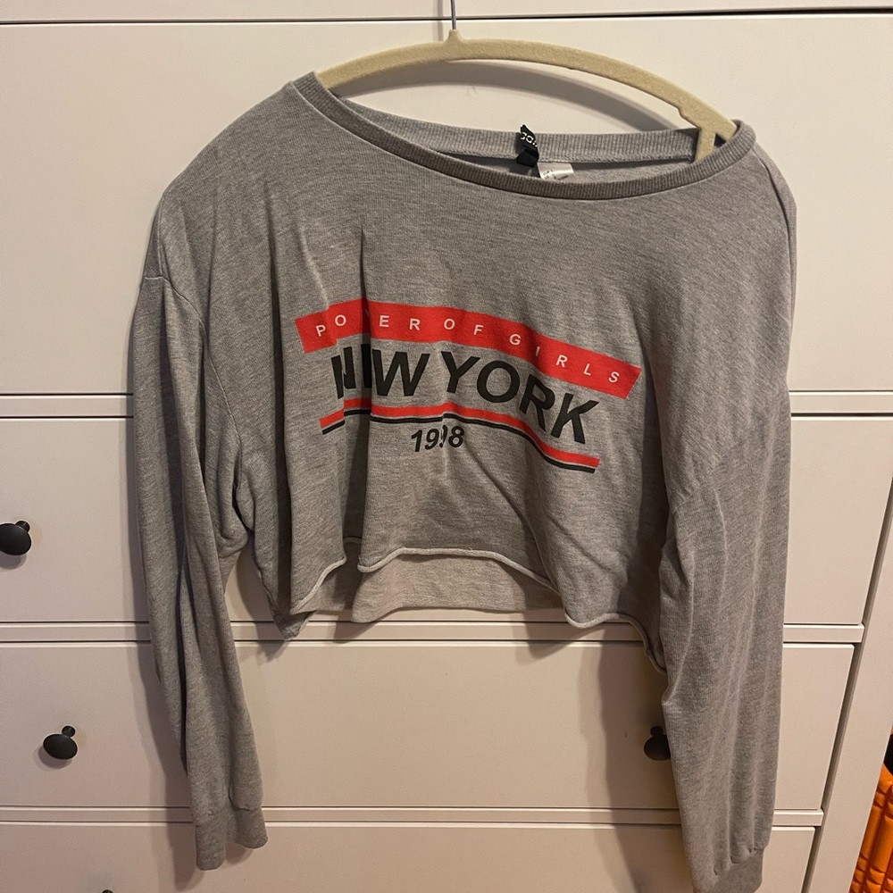 Long sleeve crop top wears like a medium but bought it in a large.